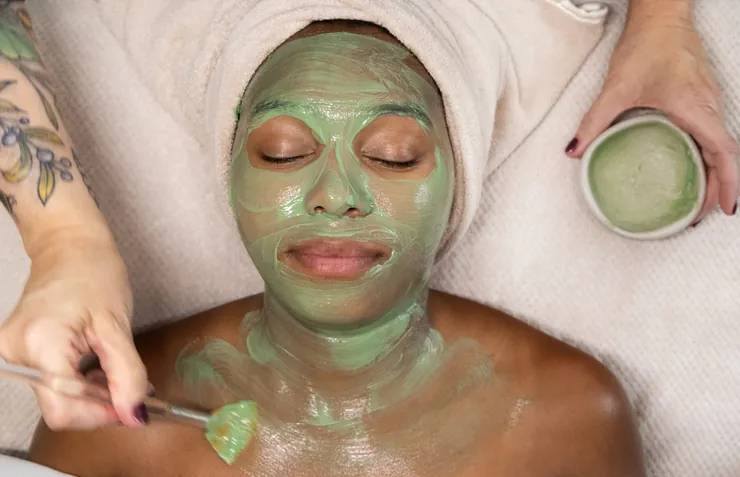 Sara providing a personalized facial treatment